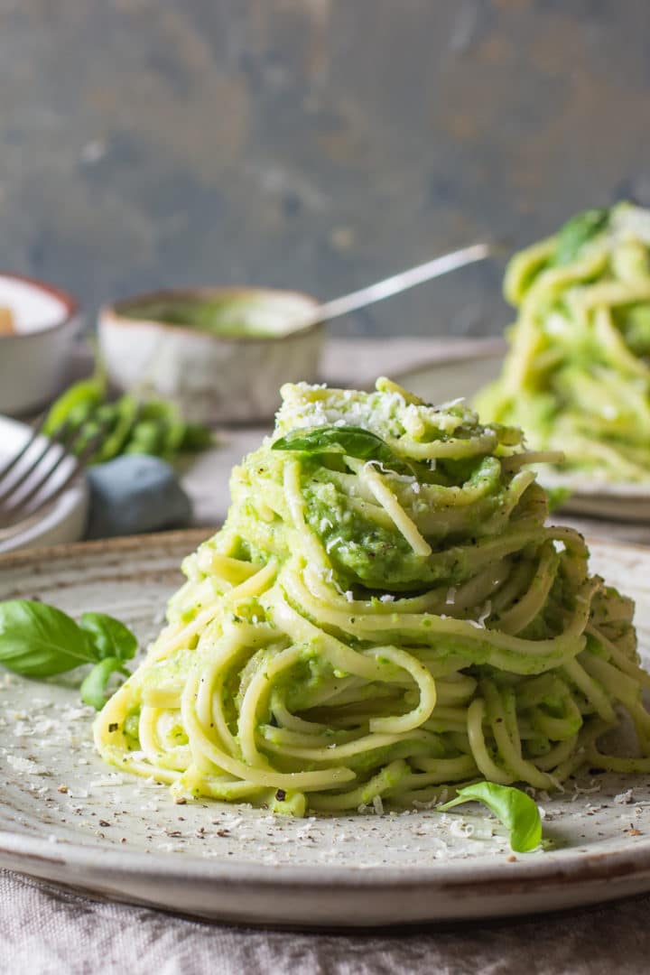 Summer pea pasta with pea puree piled onto a plate