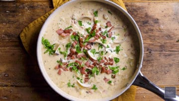 add in shells for decoration then top with bacon and fresh parsley