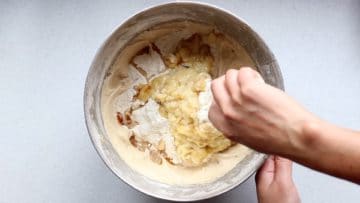 Add vanilla extract and carefully fold together the banana cake mix