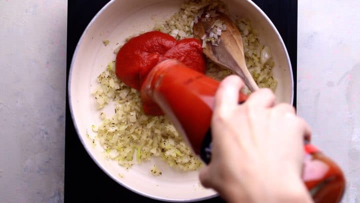 adding large jar of passata