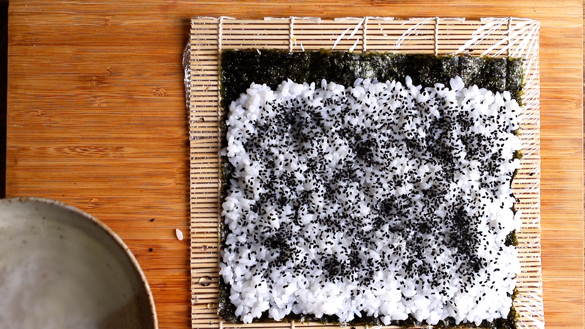 black sesame seed on top of rice for california roll