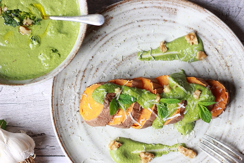 Celery, apple and walnut pesto drizzled over circles of baked sweet potato.