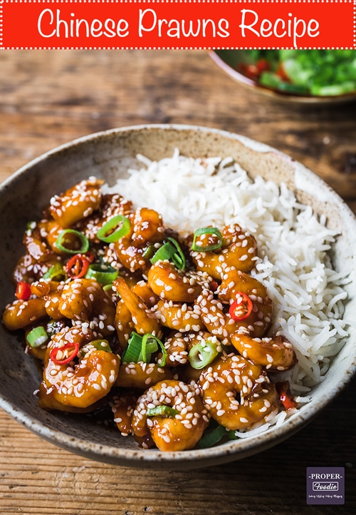 Chinese prawns recipe served with rice, sesame seeds and fresh chilli