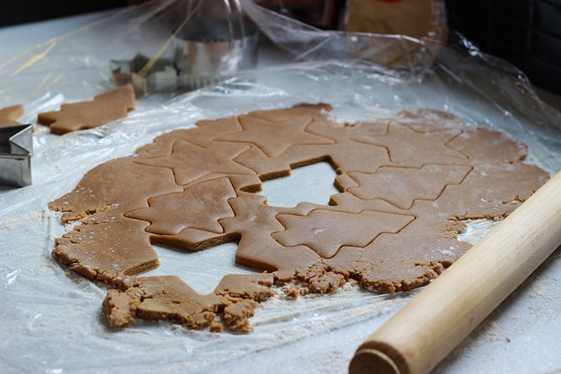 cutting out gingerbread biscuits