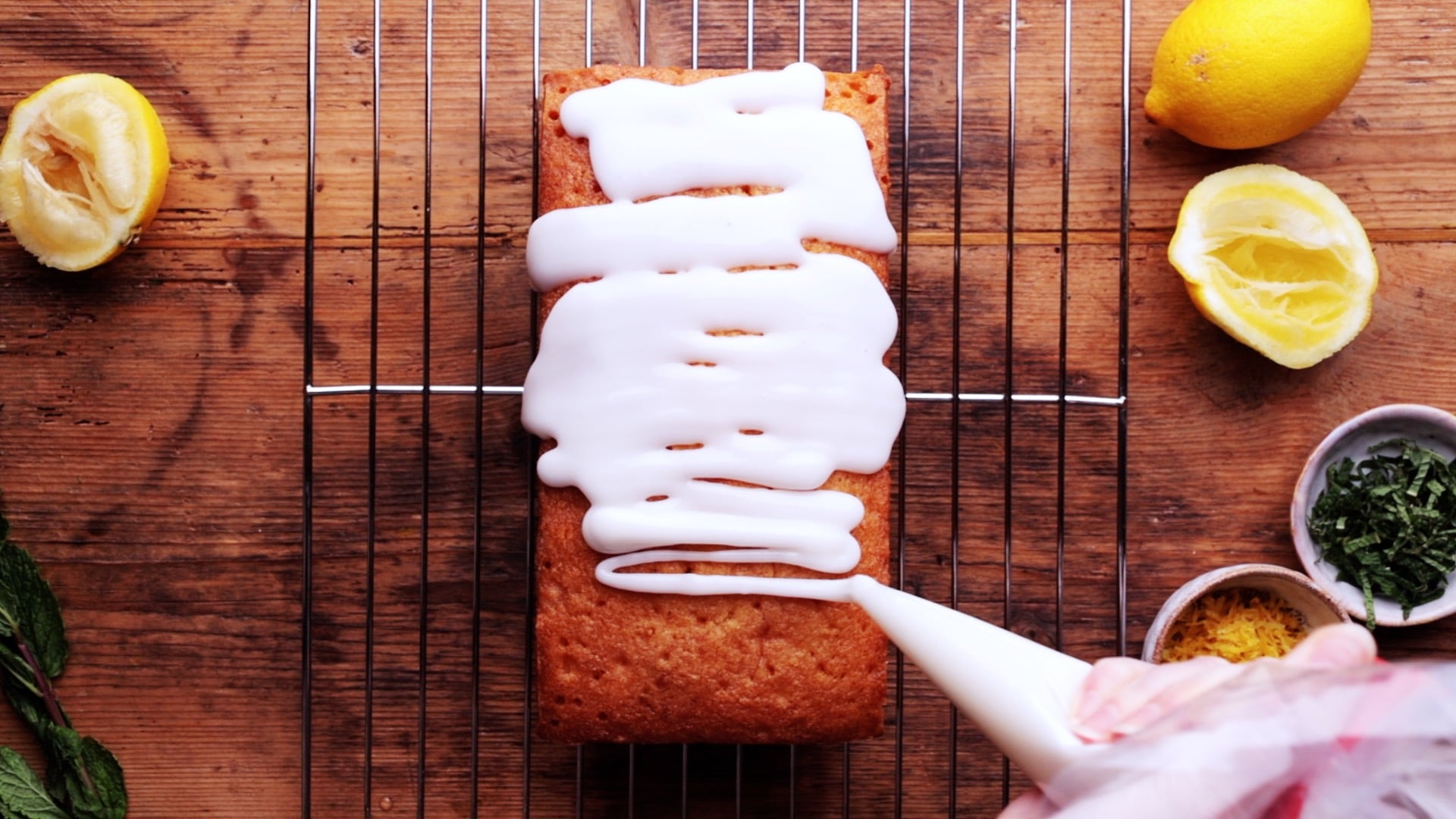 Drizzle cooled cake with lemon icing