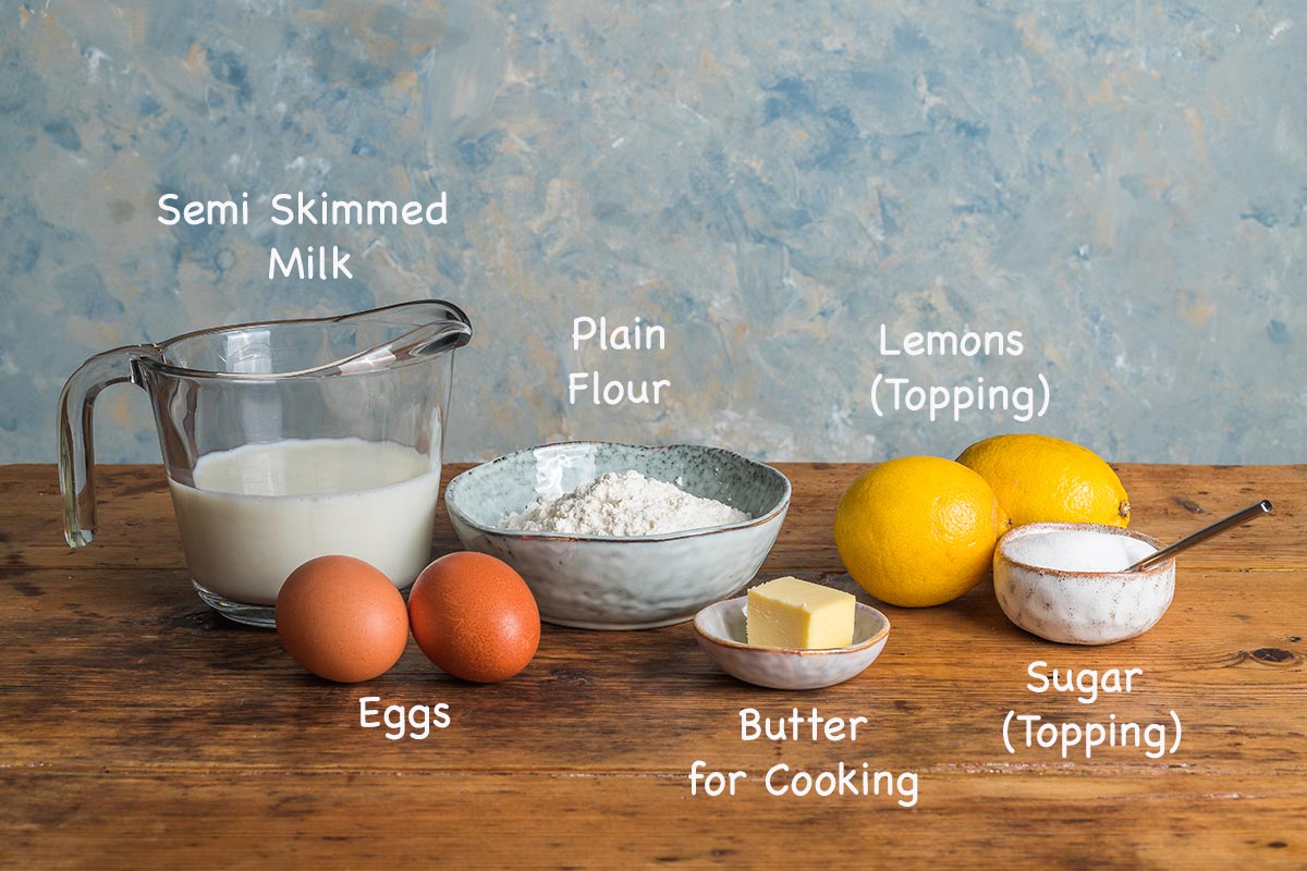 A display of the ingredients needed to make English pancakes recipe with text overlay stating each ingredients.