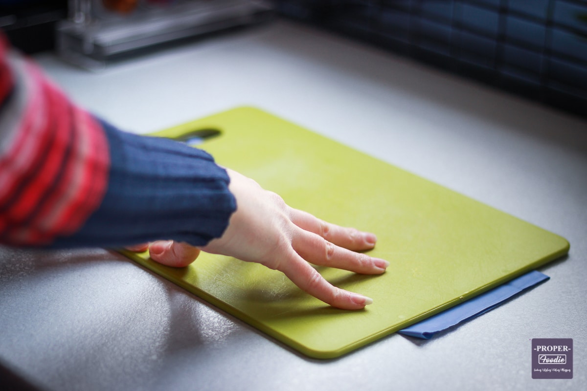 rubber glove under a chopping board to stop it slipping