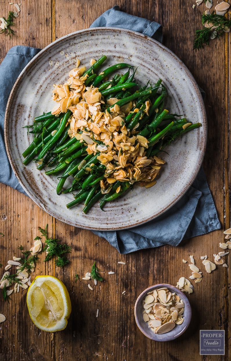 green bean almondine with almond garnish