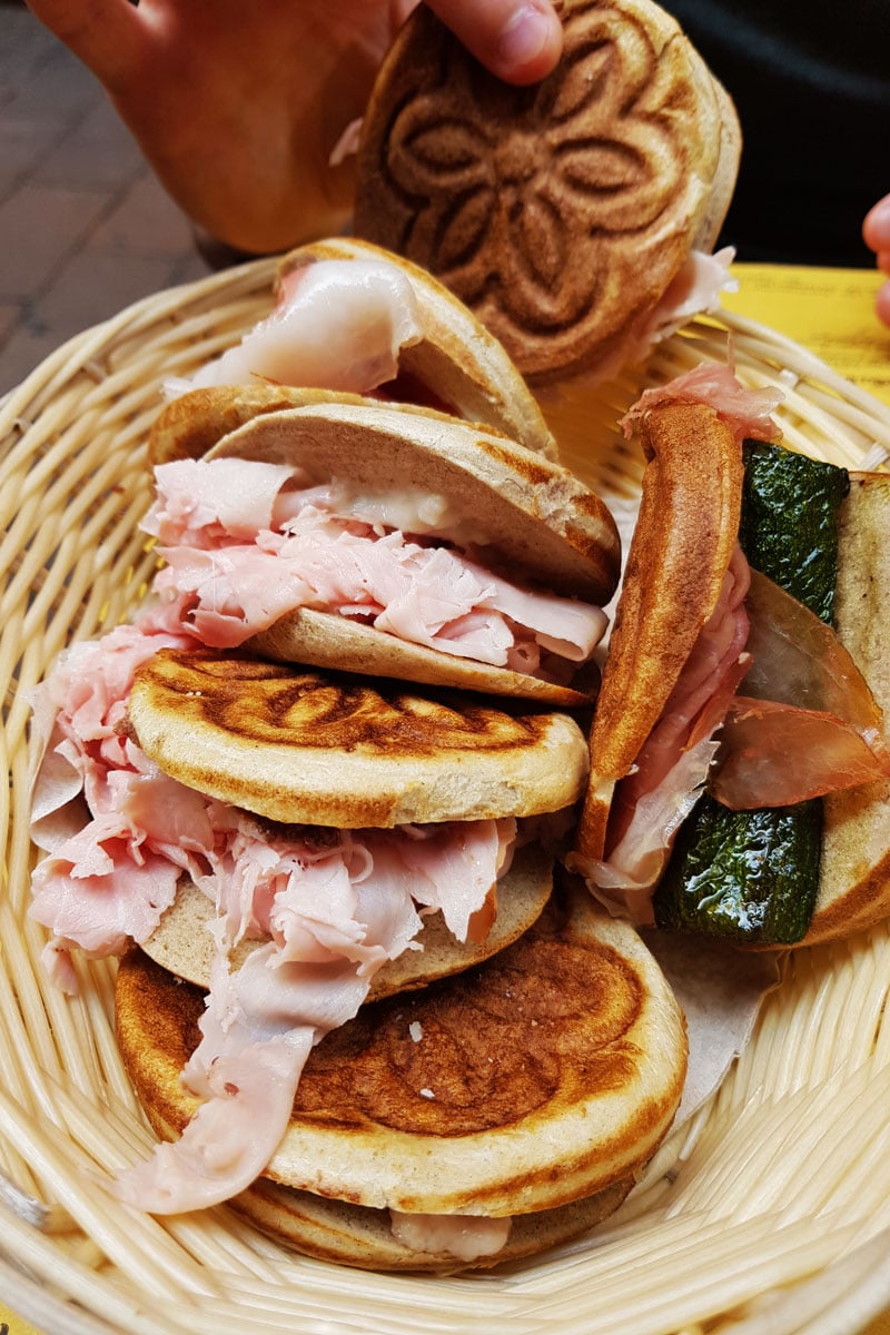 ham and cheese tigella in Bologna