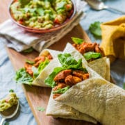 Healthy chicken wraps with paprika chicken and lettuce