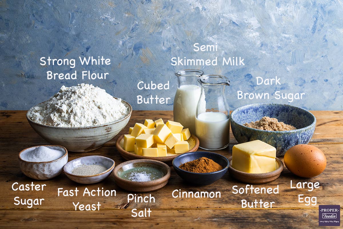 Ingredients needed to make nine cinnamon swirls, all lined up side by side in individual bowls