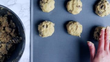 making balls out of cookie dough