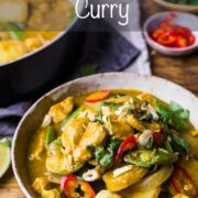 A bowl of massaman chicken curry with text overlay: Chicken Massaman Curry.