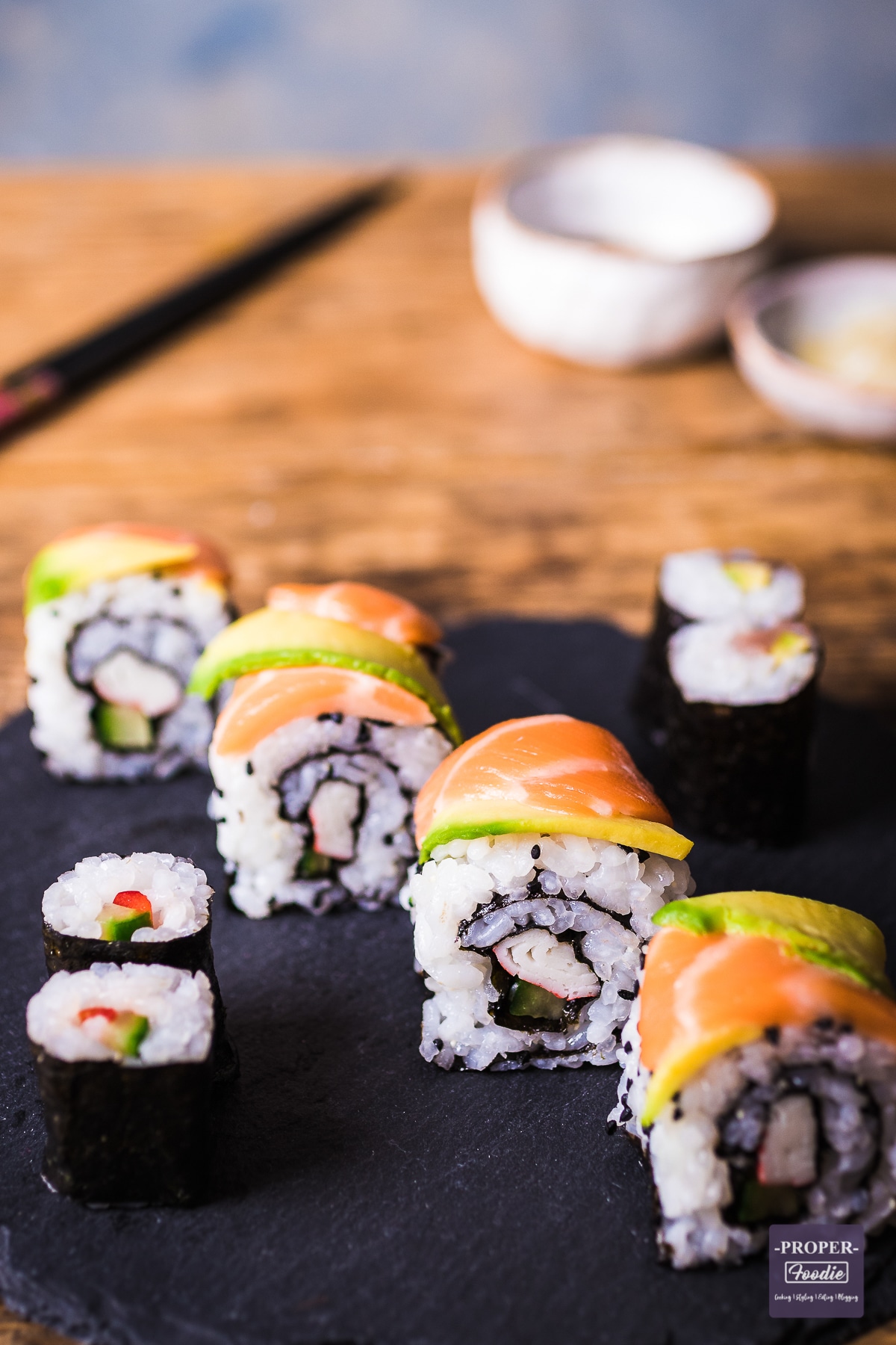 Dragon roll with avocado and salmon slices on the top