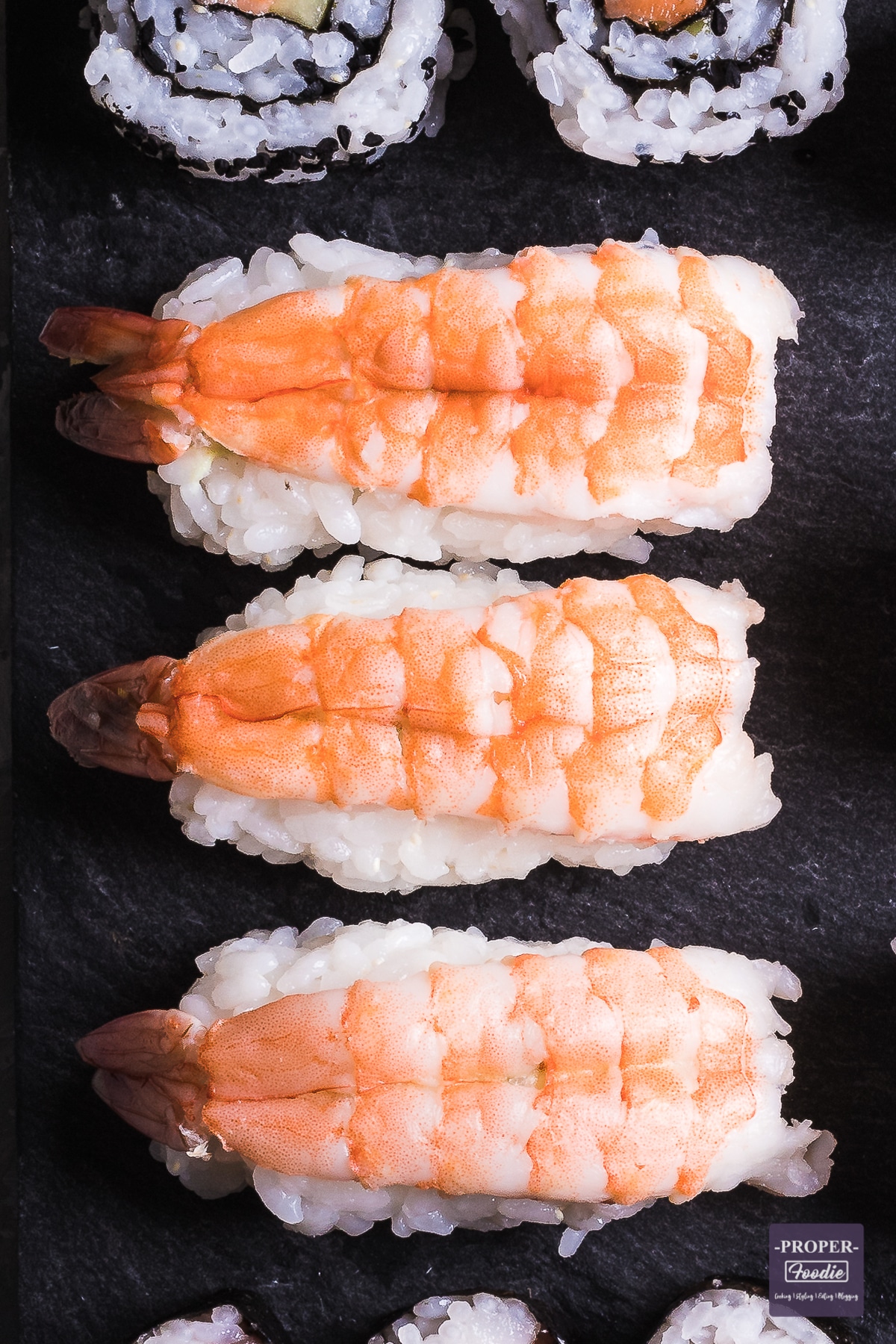 rice balls topped with butterflied prawns