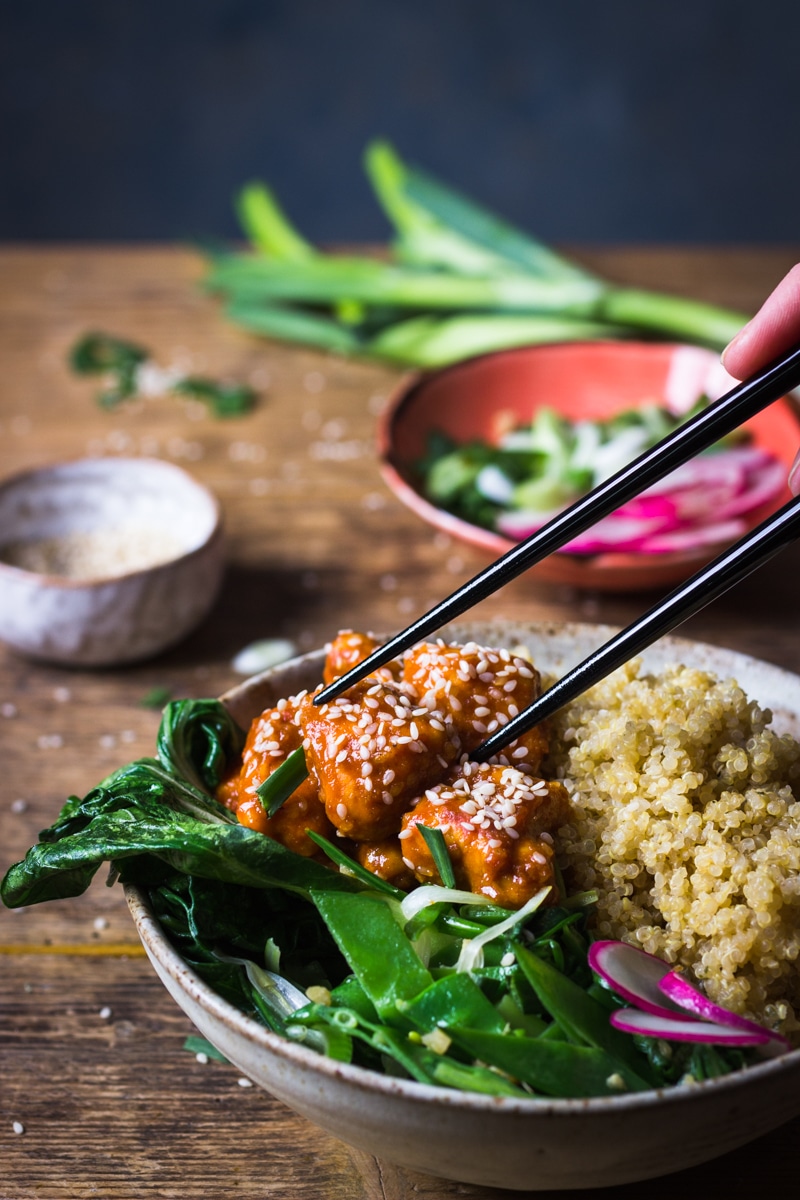 sesame seed chicken with chop sticks