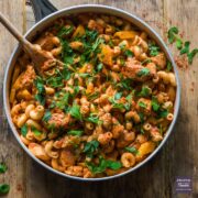 A large pan filled with Cajun chicken pasta.