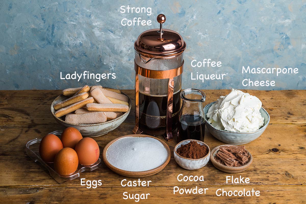 Ingredients needed to make a traditional tiramisu recipe.